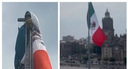 (VIDEO) Bomberos ‘rescatan’ bandera del Zócalo CDMX tras quedar atorada en asta