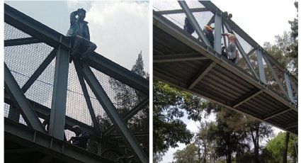 (FOTOS) Evitan suicidio en Churubusco: rescatan a hombre que intentó aventarse de puente