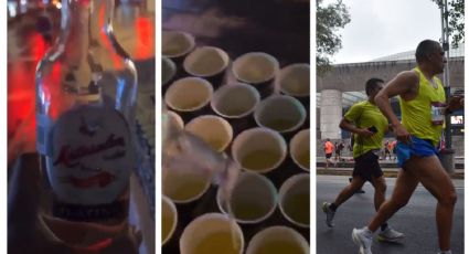 (VIDEO) Maratón CDMX: Hombre se graba poniendo ron a vasos de competidores