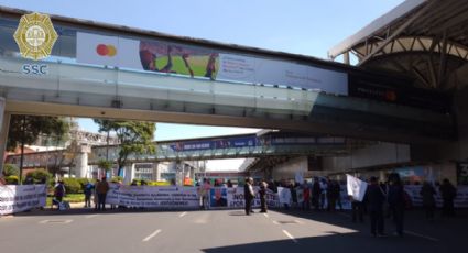 Protesta en el AICM: jubilados de Mexicana bloquean acceso a Terminal 1