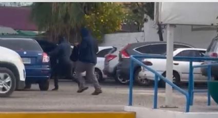 (VIDEO) Captan escape de 2 hombres encapuchados tras robar un millón de pesos en La Paz